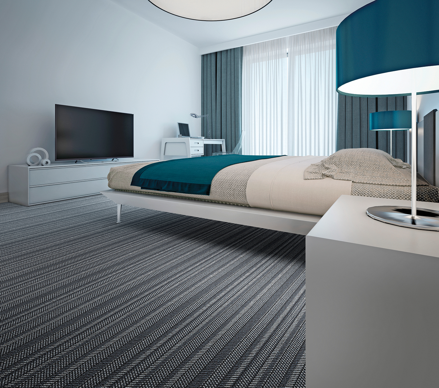 Lindisfarne herringbone tufted carpet installed in a modern, minimalist hotel room.