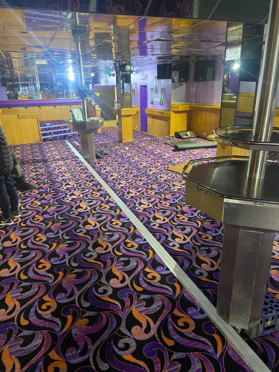 Acapulco Nightclub Halifax bar with bespoke purple and black patterned carpets designed by Wilton Carpets