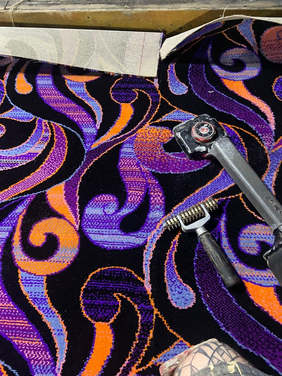 Acapulco Nightclub Halifax close-up shot of bespoke purple and black patterned carpets designed by Wilton Carpets