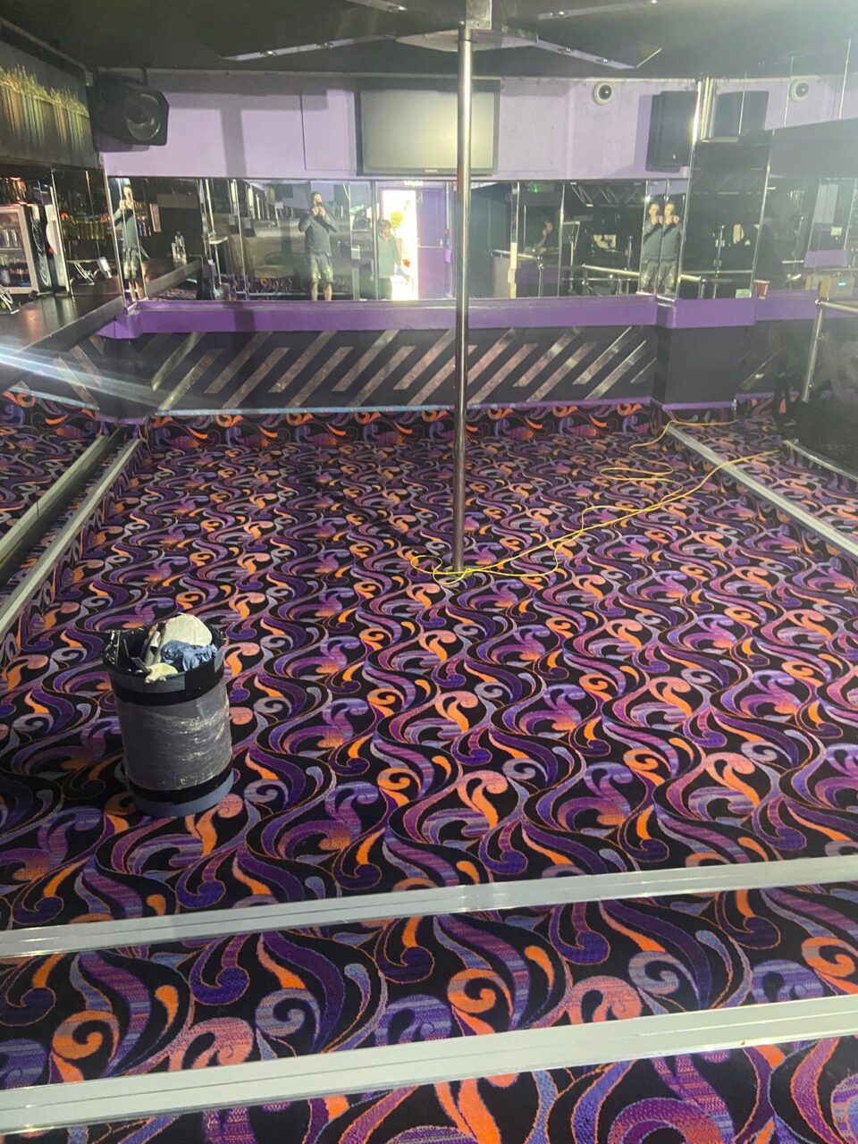 Acapulco Nightclub Halifax pole dancing area with bespoke purple and black patterned carpets designed by Wilton Carpets