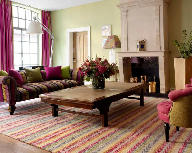 A multicoloured hotel interior that matches with a bespoke Wilton rug