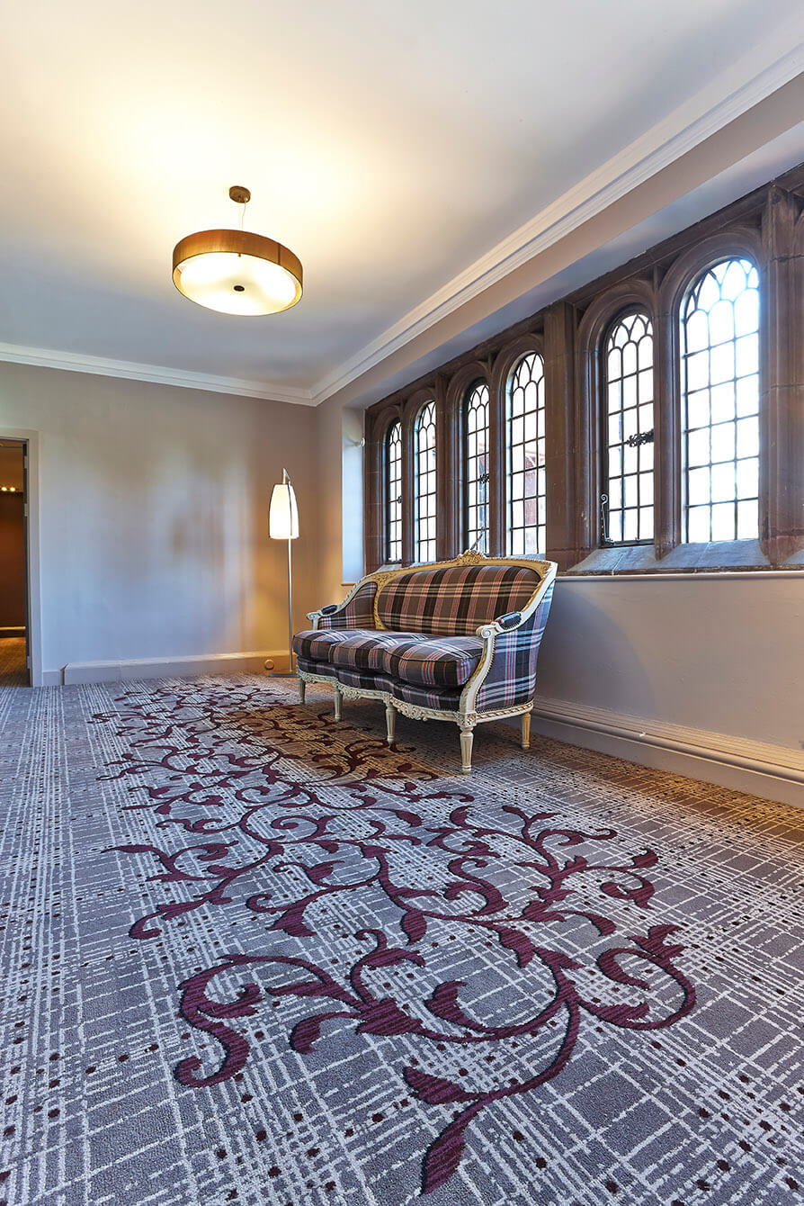 Abbey House Hotel hallway entrance, with a grey and cream striped carpet, designed bespoke by Wilton Carpets