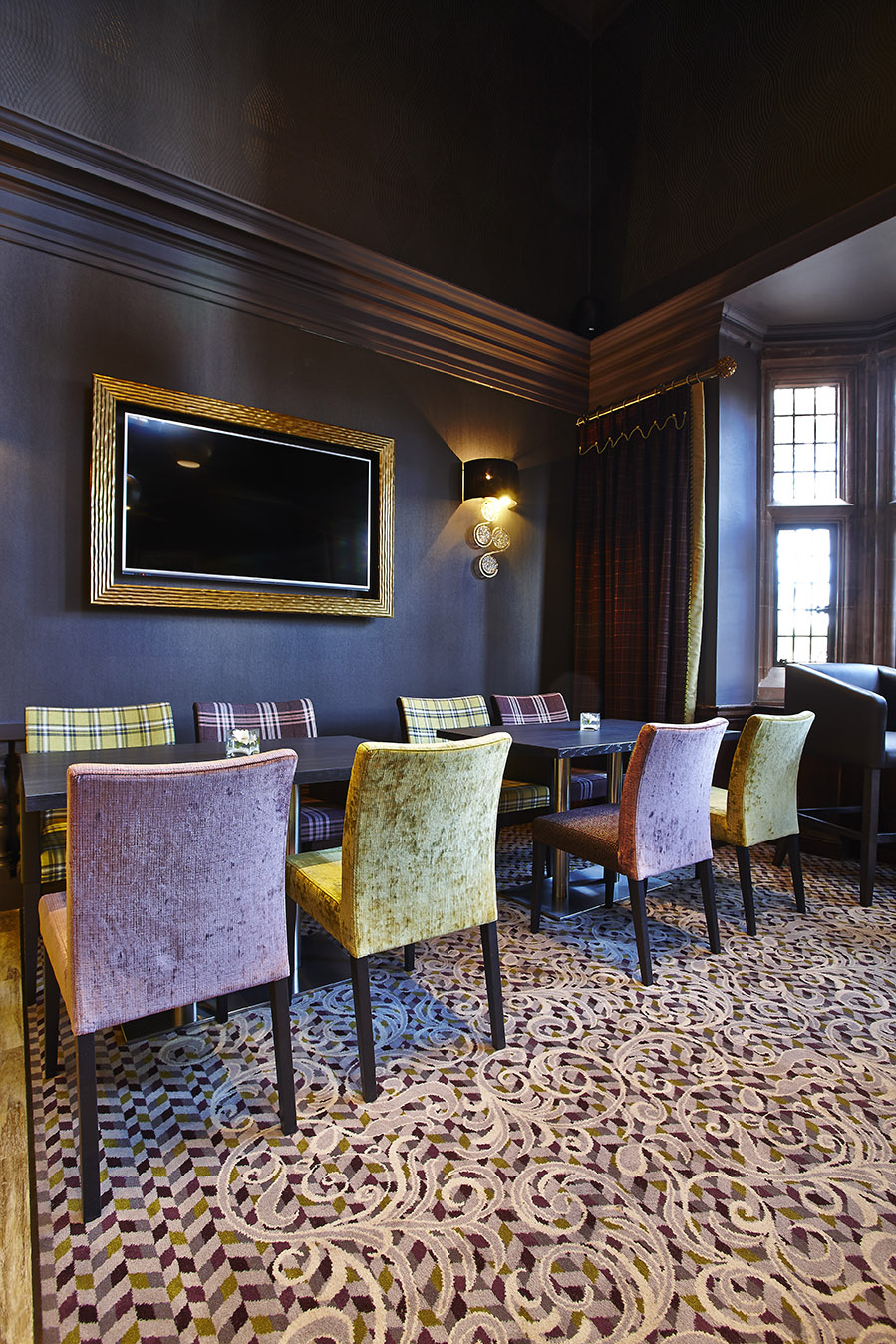Abbey House Hotel bespoke restaurant carpet, with grey and cream floral patterns, designed by Wilton Carpets